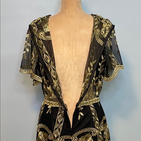 Elegant Black and Gold Romper with Modern Flair Size Medium - Picture 10 of 12